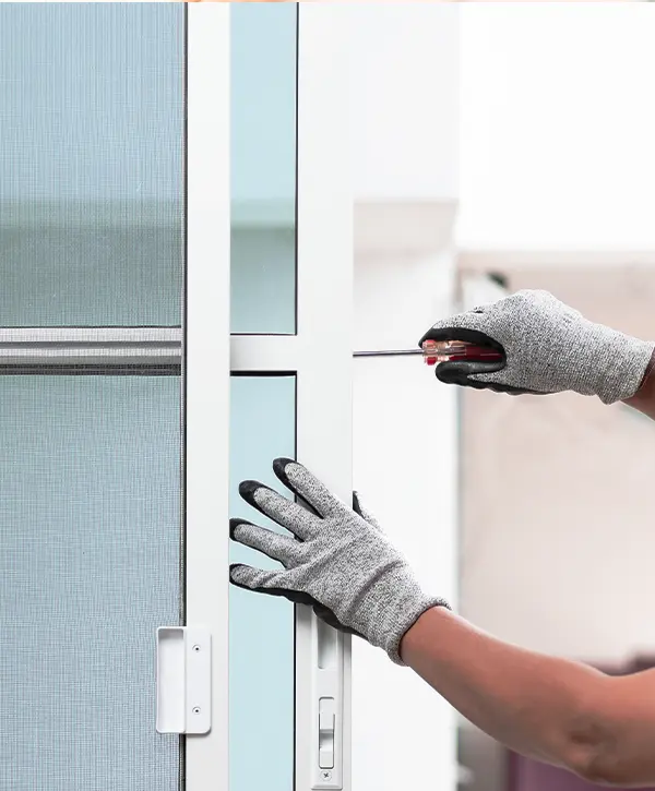 Worker Installing Sliding Glass Door In Alabama